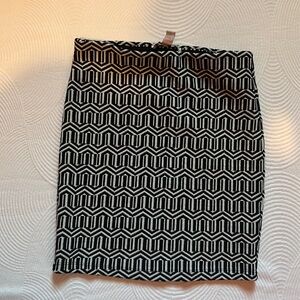 High waisted tight fitting skirt, black and white design, great condition